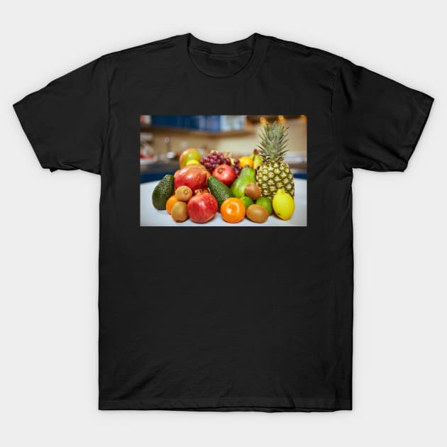 Exotic fruits on the table in the kitchen T-Shirt by naturalis